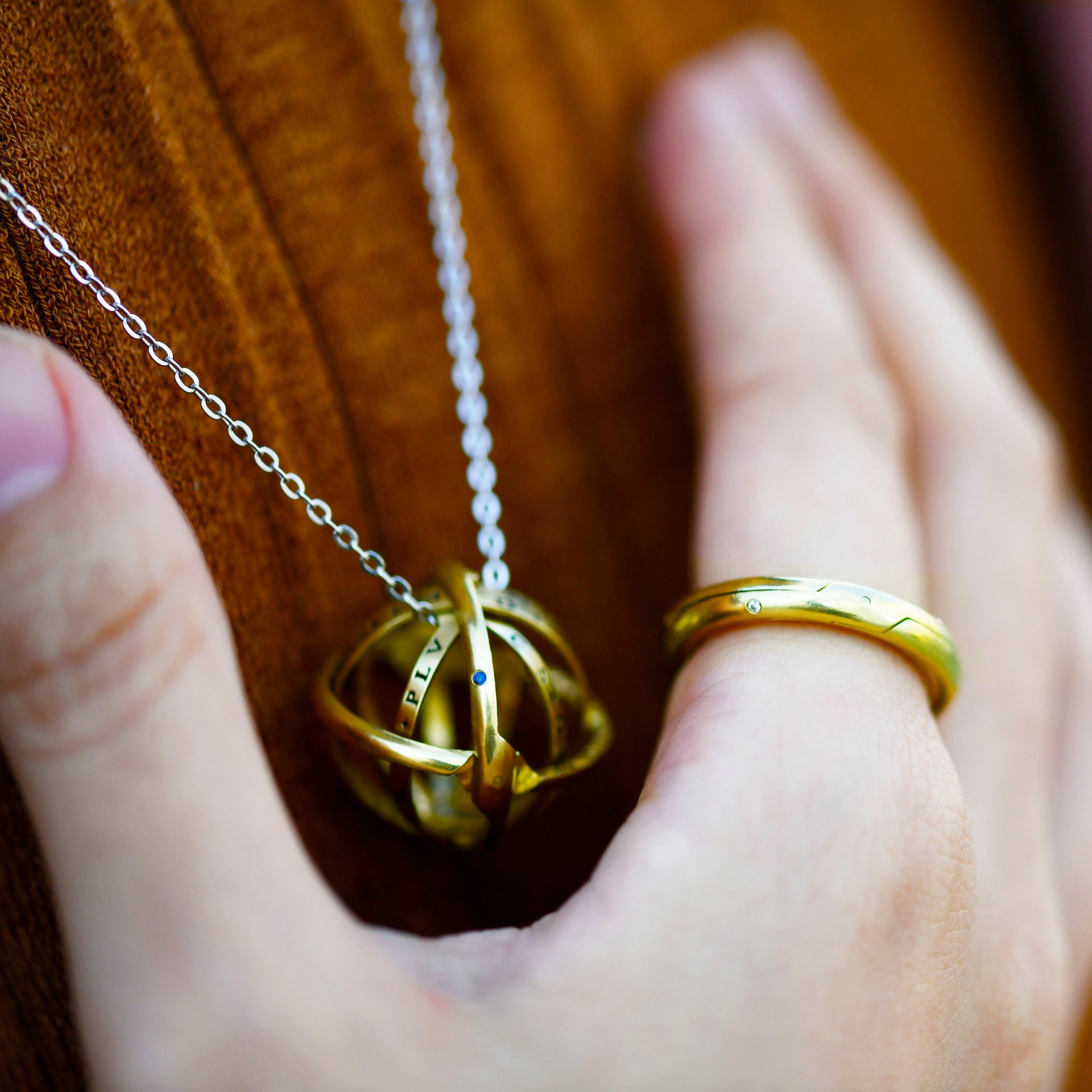 Handmade astronomical ring with sculptural sphere inspired design
