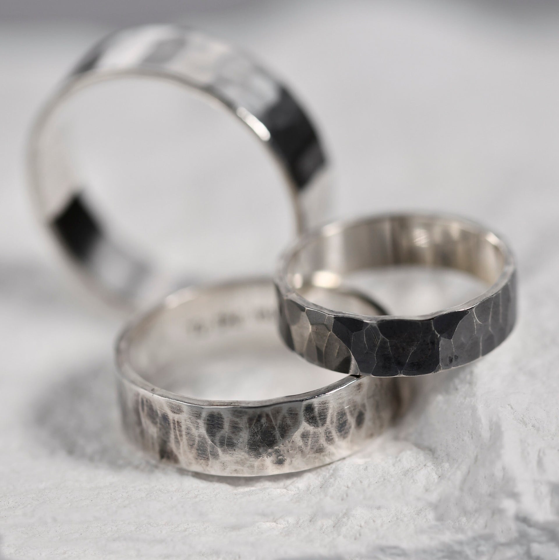 Rustic oxidized silver band with deep surface texture, suitable for men, women, or unisex wear.