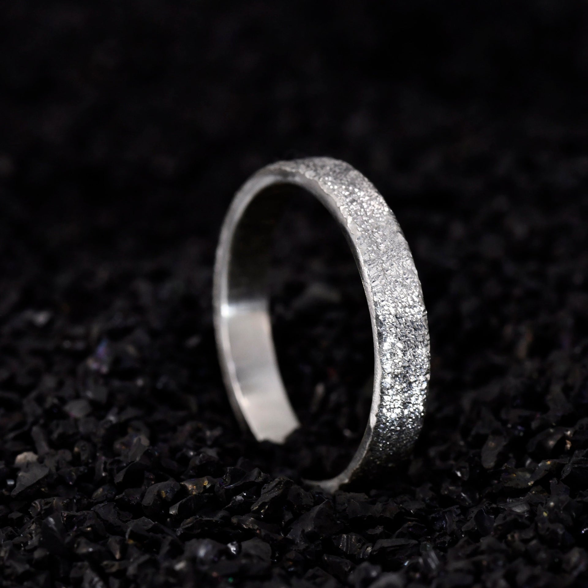 4mm silver stacking ring shown on hand for slim everyday fit