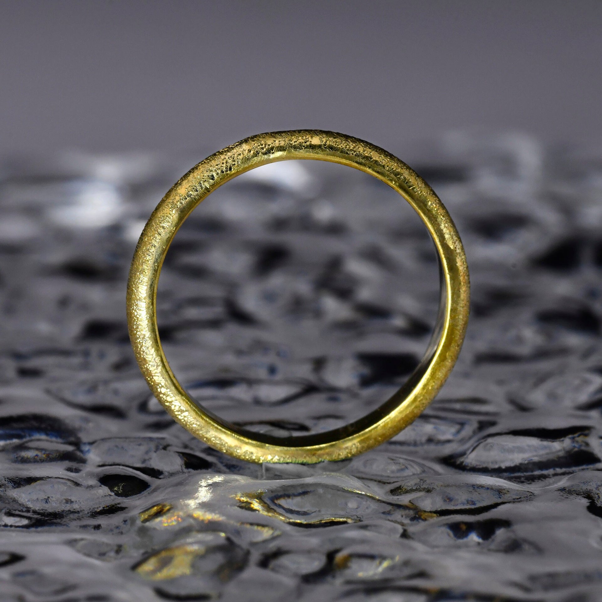 14K solid gold wedding band with subtle handmade texture