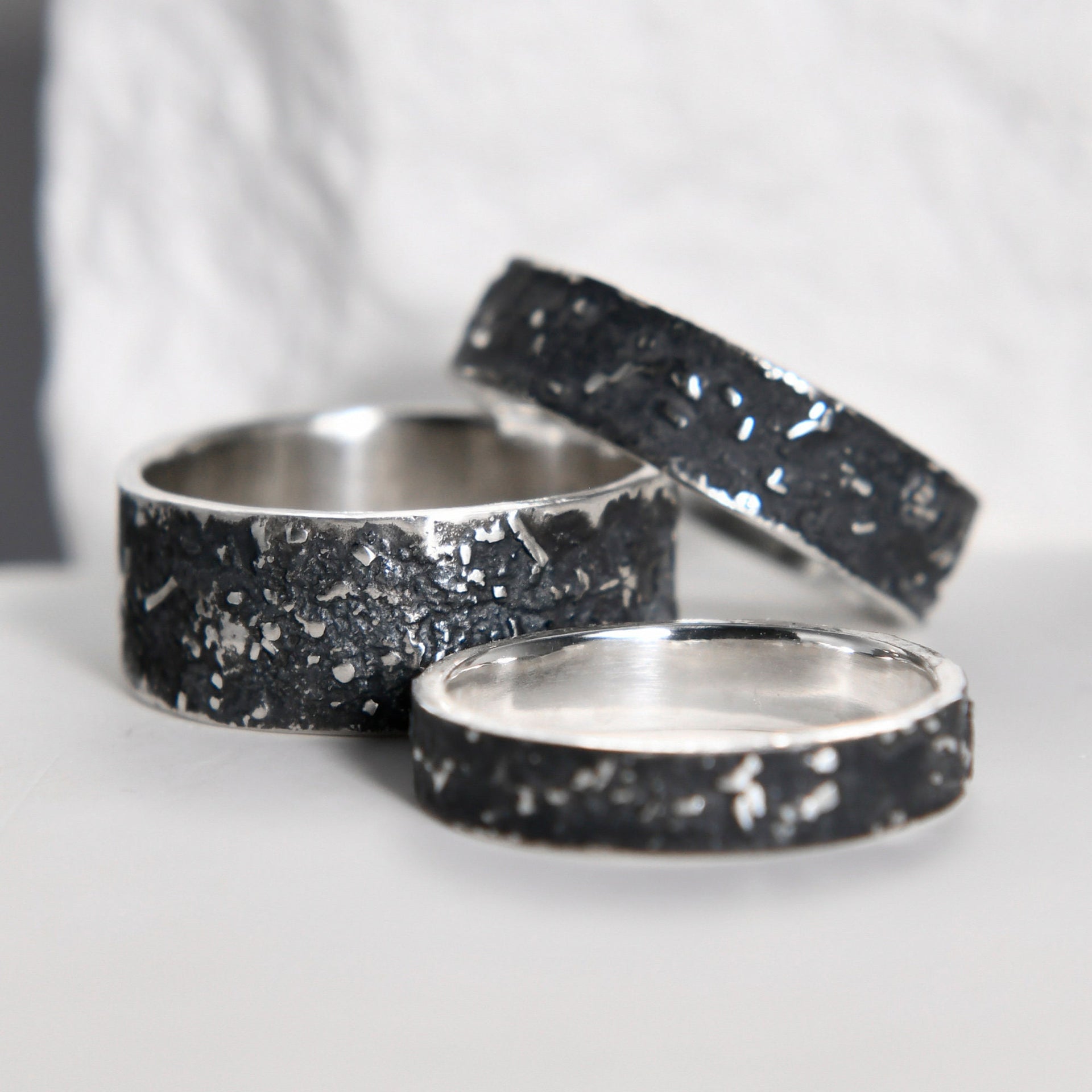 YophieMade oxidized silver galaxy texture ring set, designed as matching bands with rustic character.