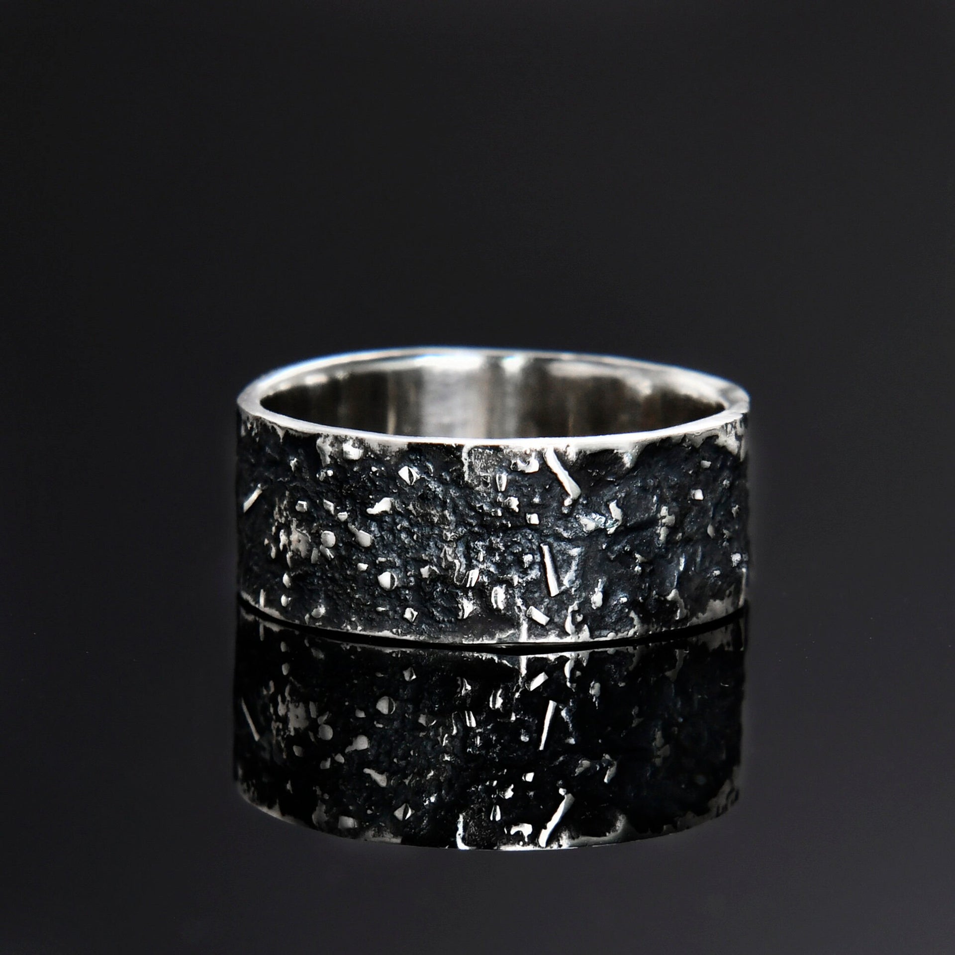 Wide sterling silver galaxy texture ring with oxidized gunmetal finish, handmade by YophieMade.