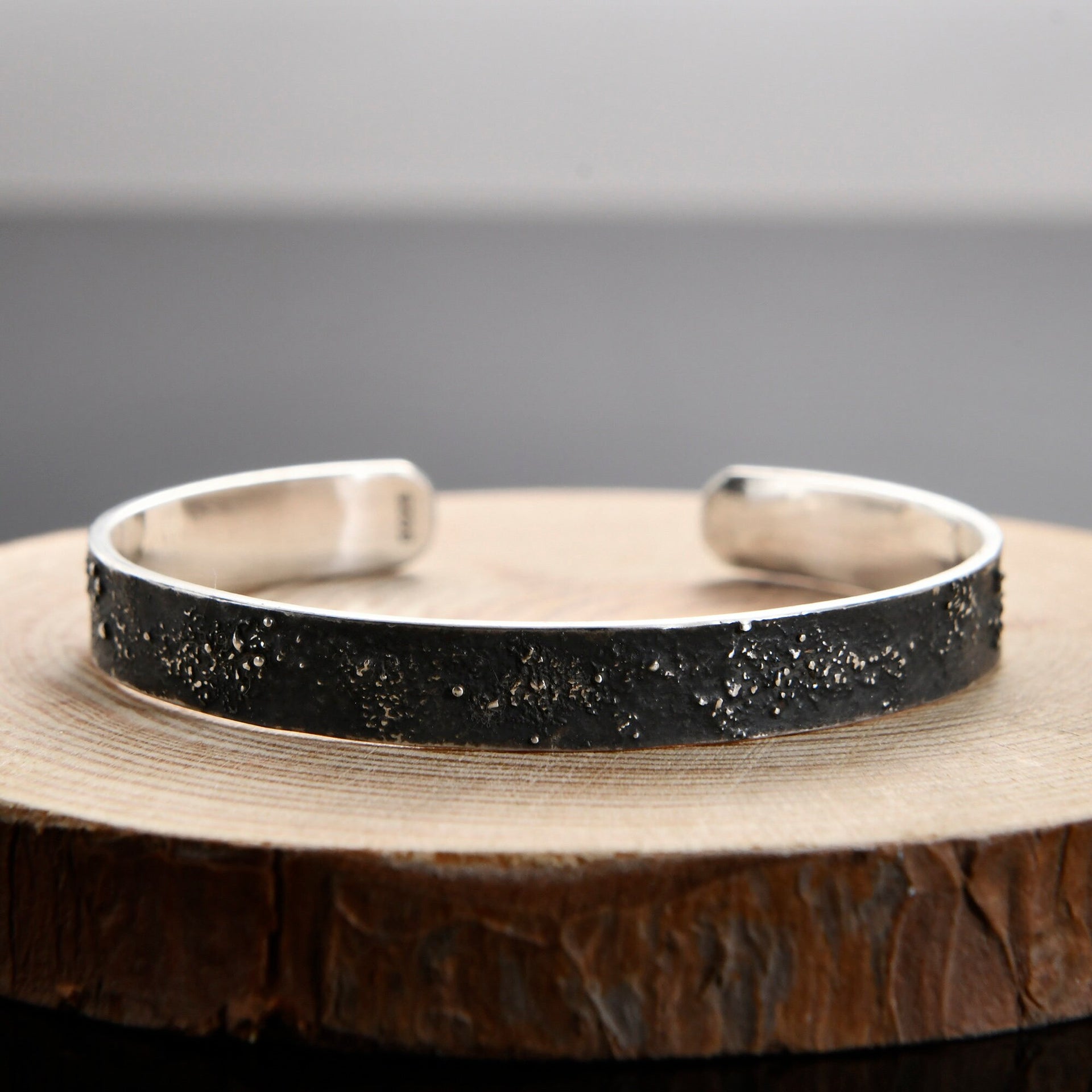 Medium width galaxy bracelet worn as meaningful everyday jewelry