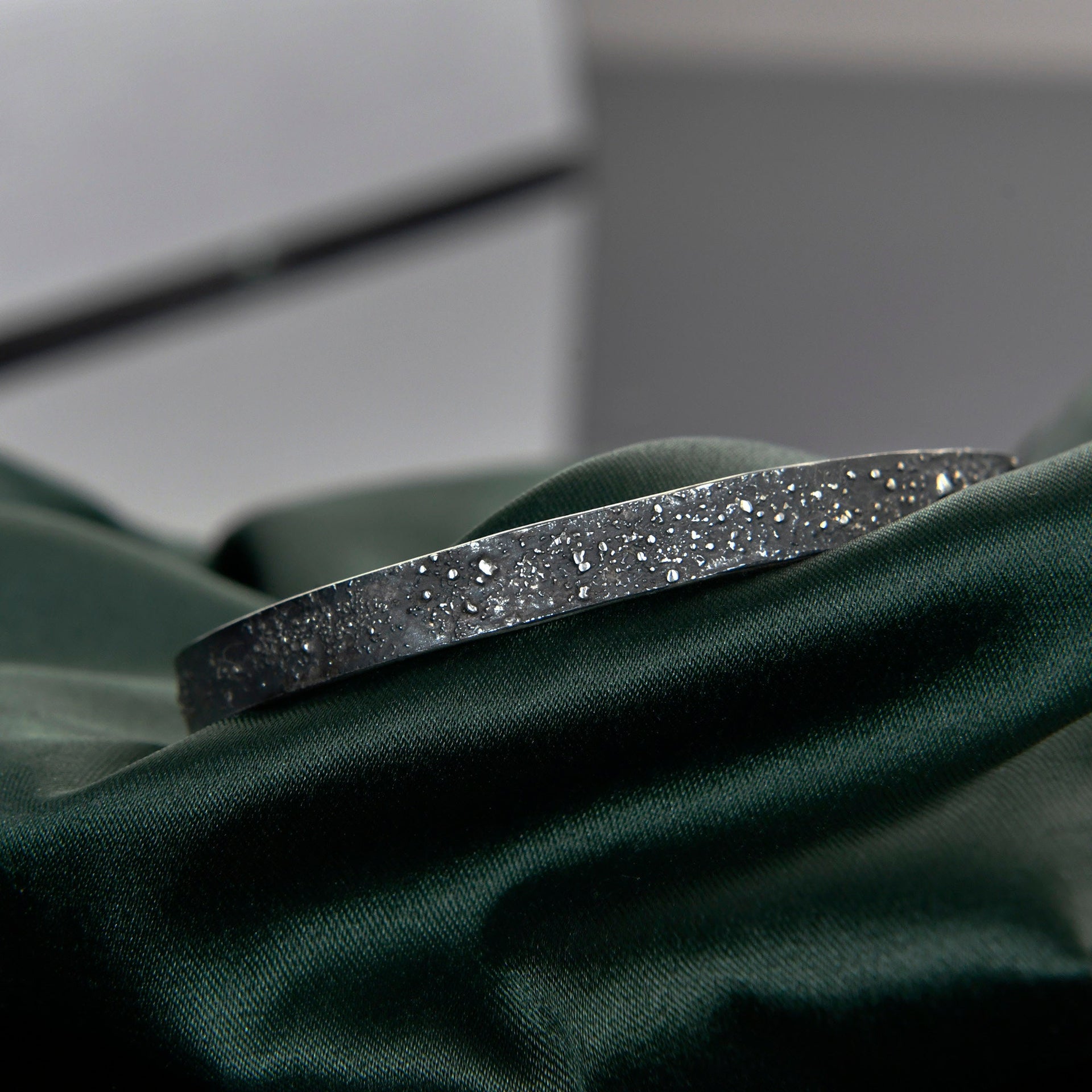 Slim celestial bracelet worn as subtle everyday meaningful jewelry