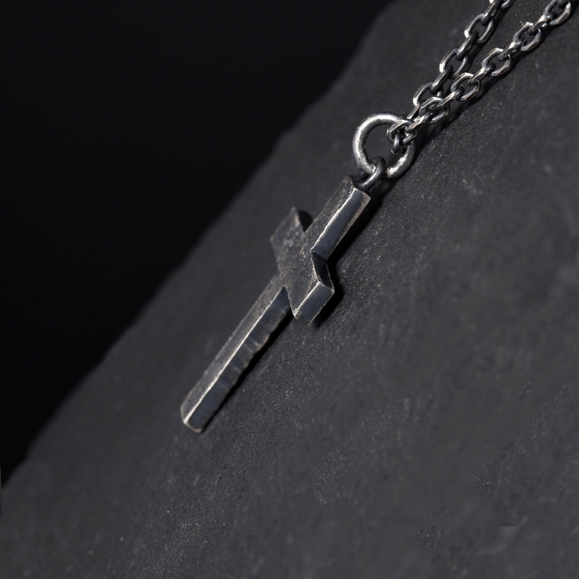 Handmade cross pendant necklace with dark oxidized silver texture