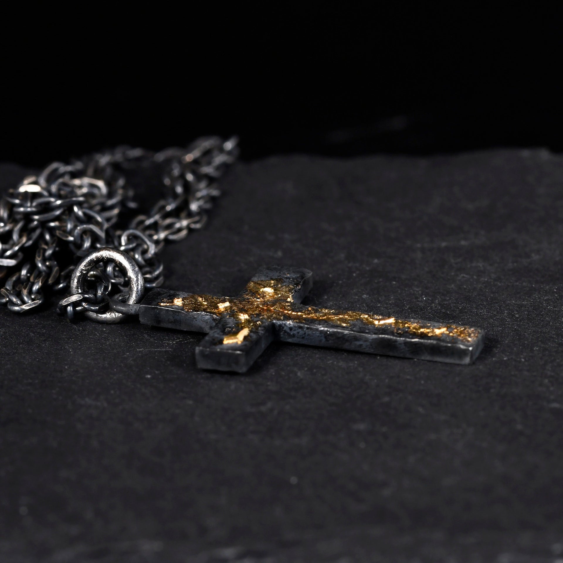 Meaningful Christian jewelry with 18K gold leaf cross pendant