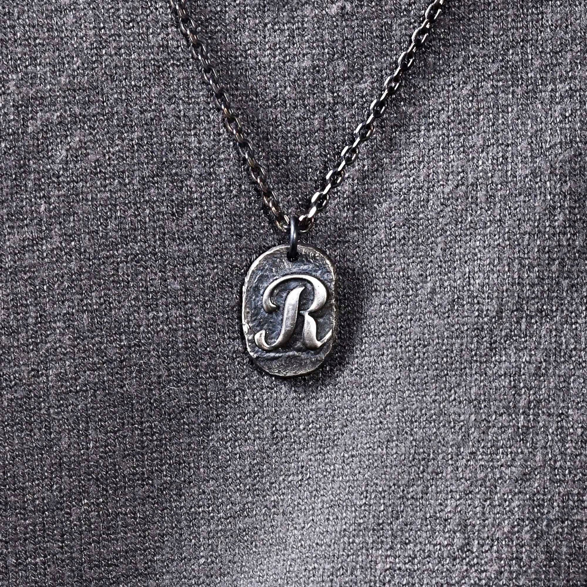 Custom stamped initial pendant with optional sterling silver chain