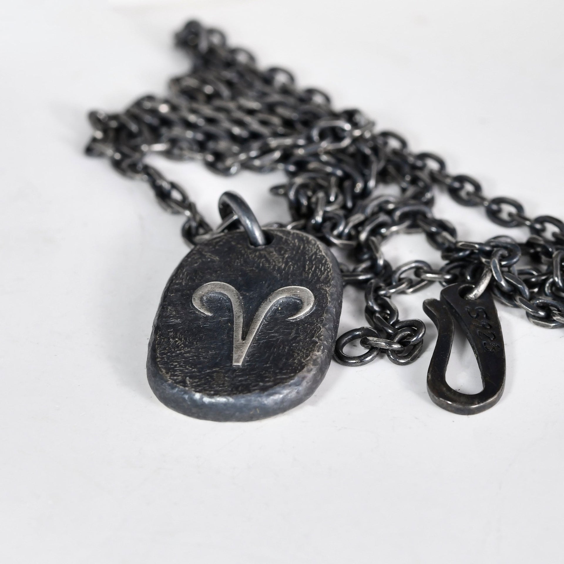 Constellation pendant worn as meaningful everyday zodiac jewelry