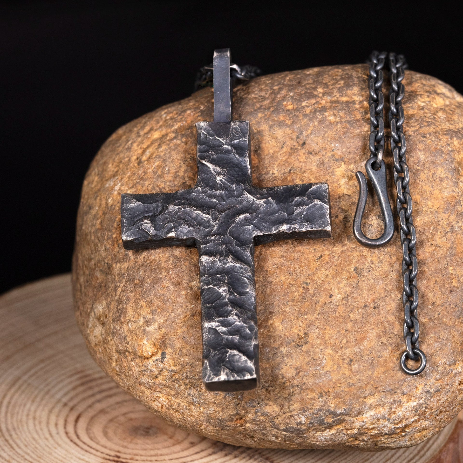 Rustic black rock texture cross necklace pendant with silver edges