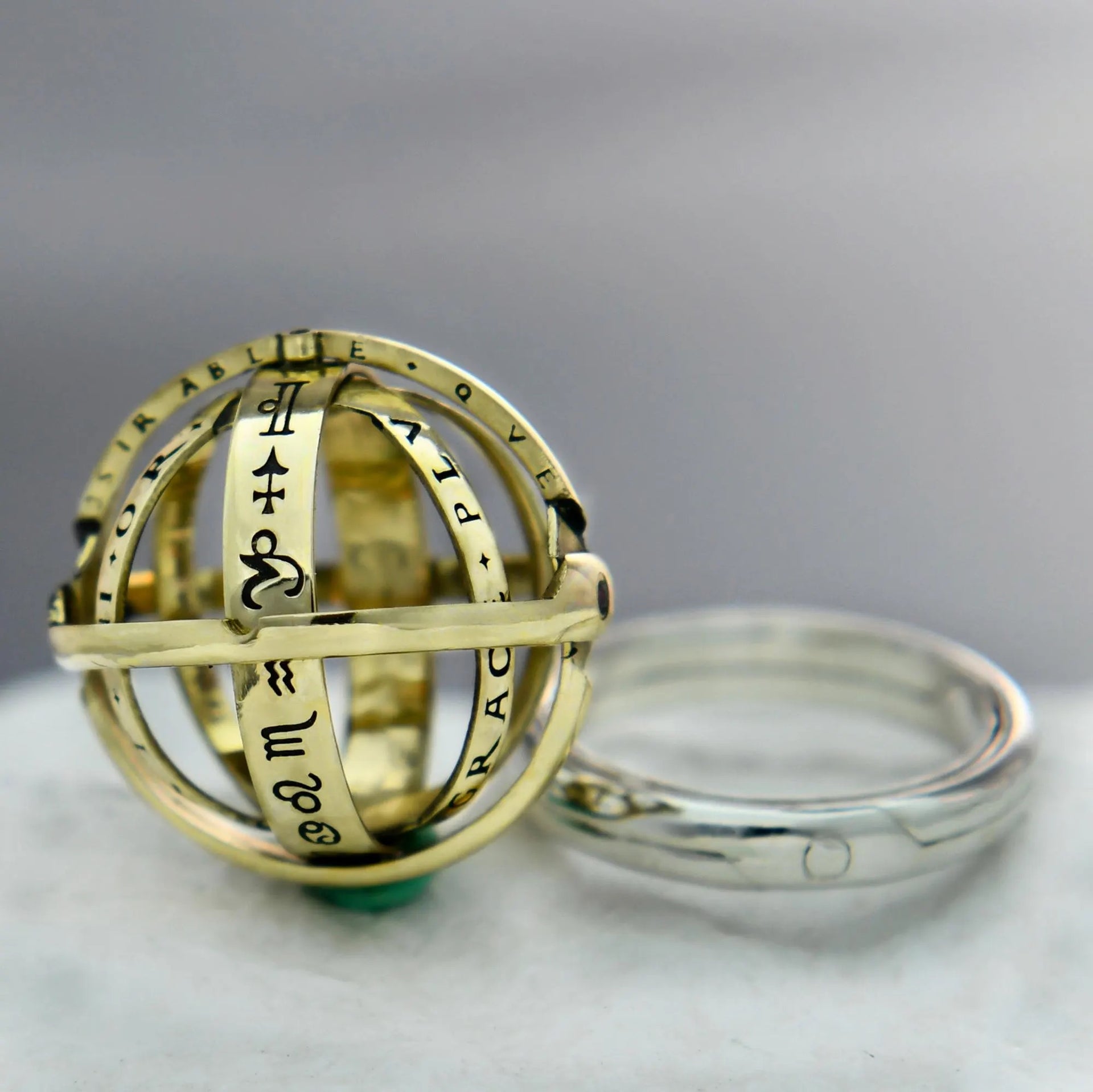 Handmade celestial jewelry with foldable sphere construction by YophieMade