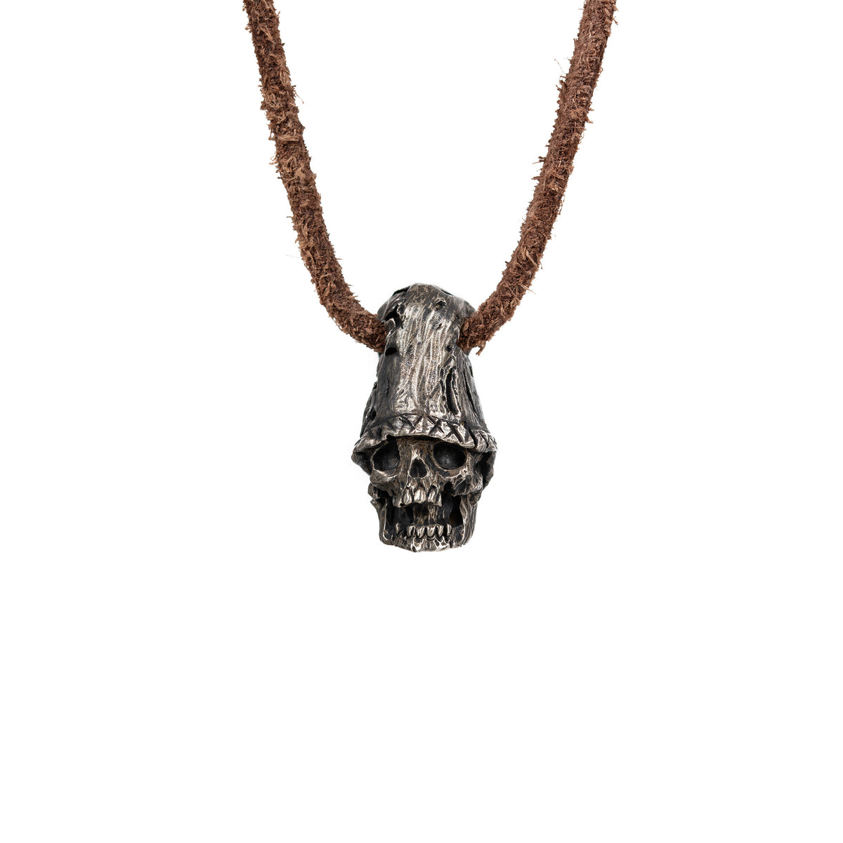 Men's top hat skull necklace in oxidized nickel silver, front view of the hand carved skull pendant on a dark brown leather cord, white background