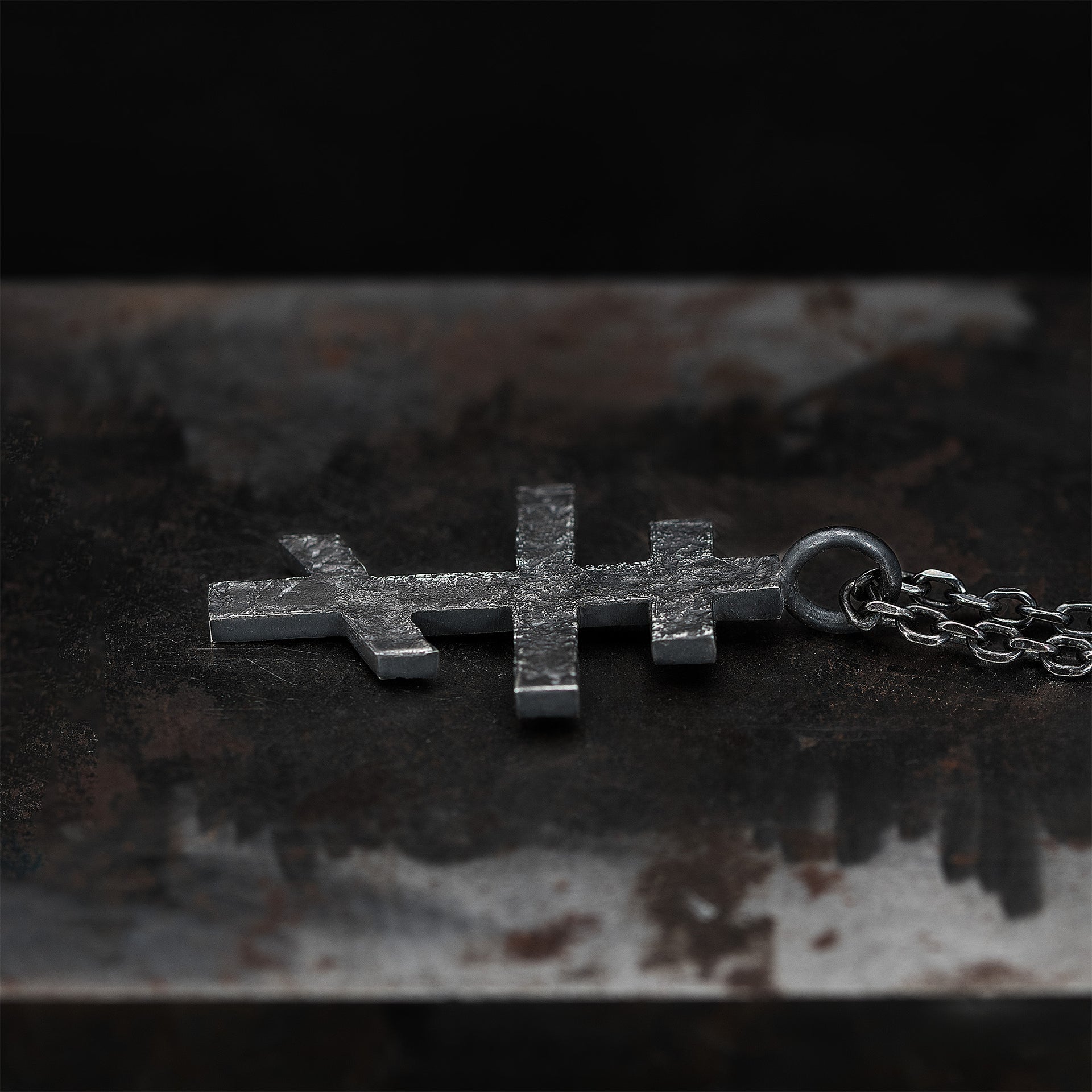 Hand-forged black sterling silver Orthodox three-bar cross pendant with oxidized texture and chain by YophieMade